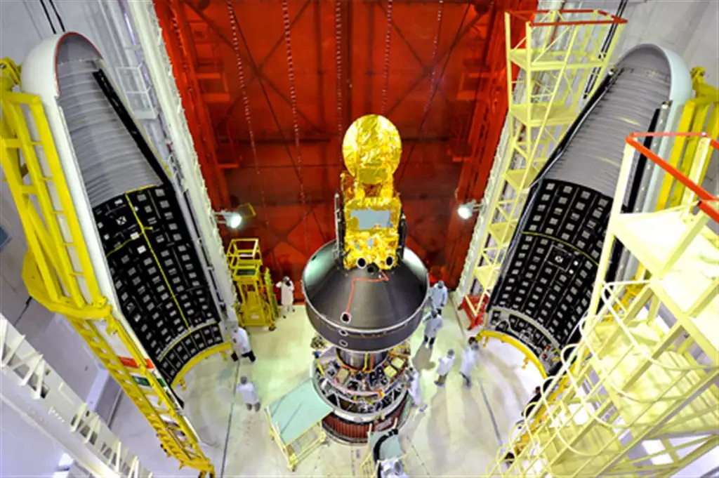 Panoramic view of SARAL (top) and smaller satellites (below) attached to the fourth stage of PSLV-C20