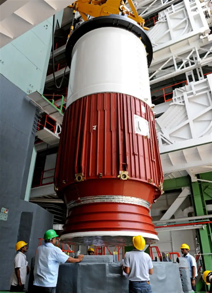 IMAGE OF PSLV-C21 FIRST STAGE NOZZLE END SEGMENT BEING PLACED ON LAUNCH PEDESTAL